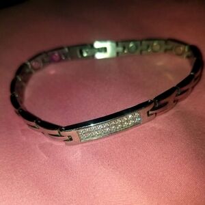 Cubic zirconium and silver plated tennis bracelet